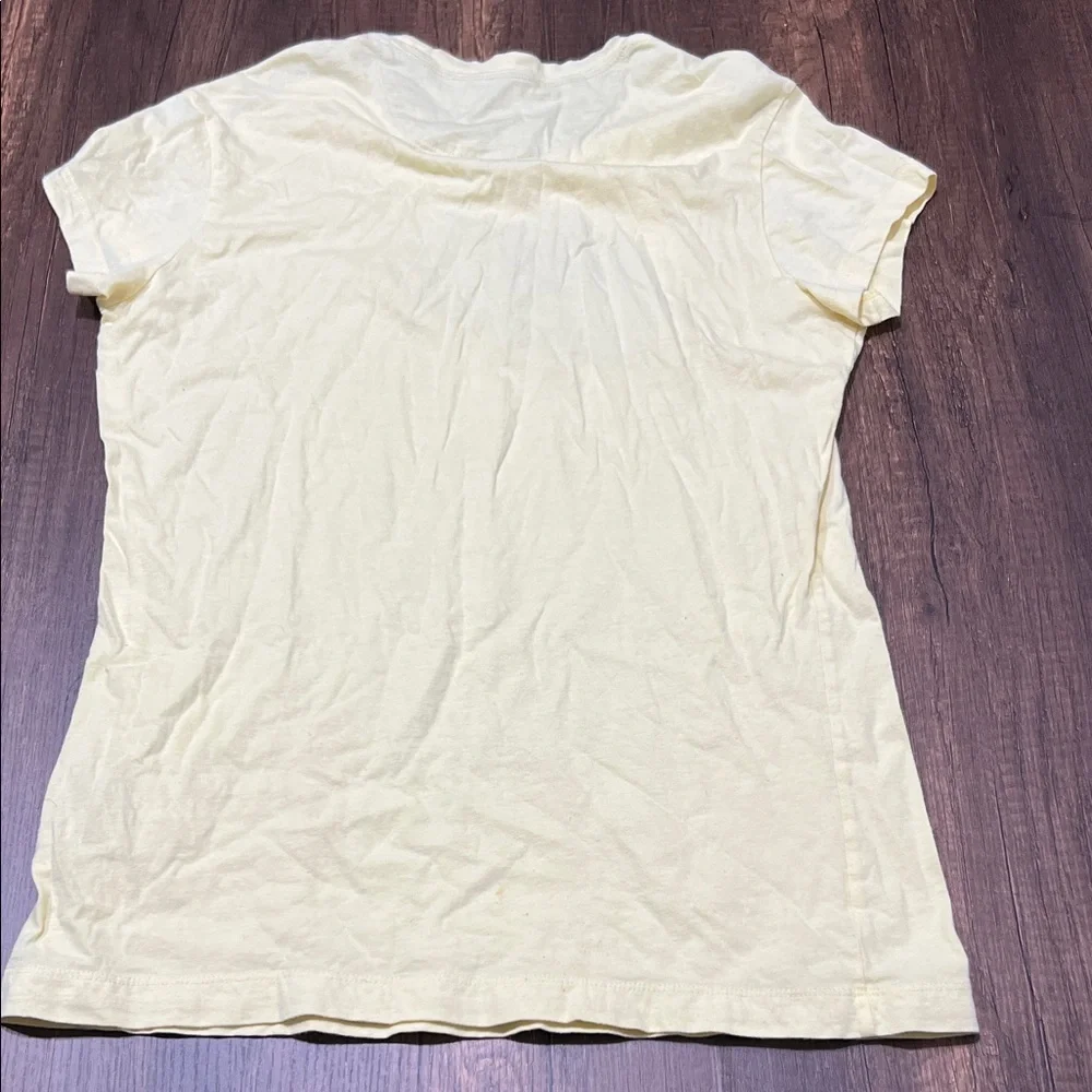 Nike‎ Yellow Tee with Multicolor Logo.  CAJA. # 1. D